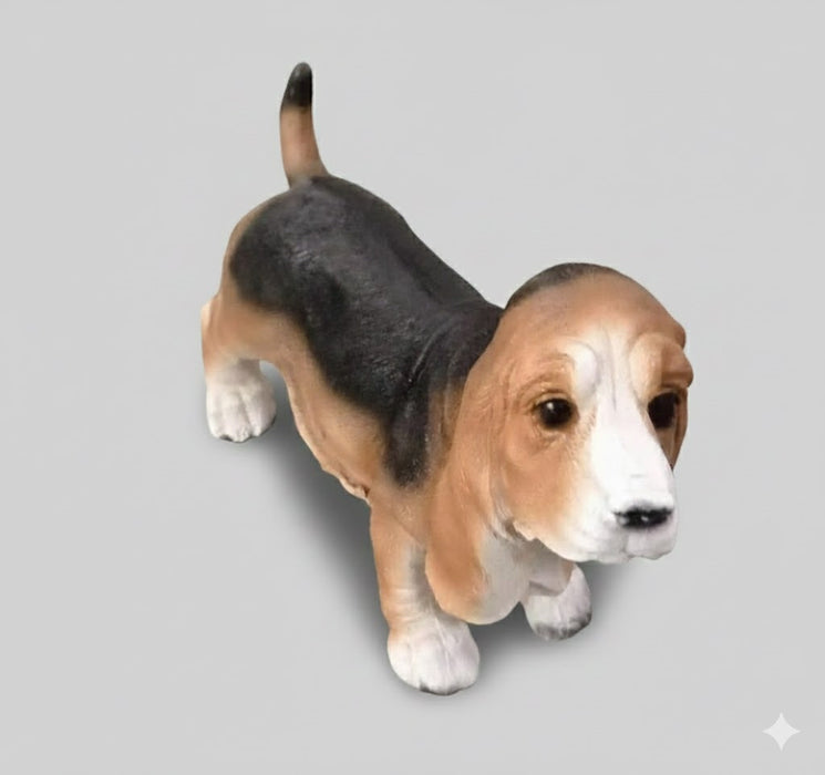 Tri-color dog figure with long ears.