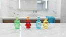 Four colorful animal-shaped novelty bottles or containers