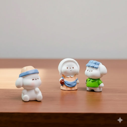 "Miniature collectible puppy dog figurines for desk or miniature garden display."