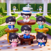 Set of 6 cute chibi anime detective and thief miniature figurines arranged on small wooden tables in a sunny formal garden with a fountain.