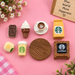 set of 8 miniature cafe items including coffee cups, soft-serve ice cream, a cookie, and a tiny wooden table sign