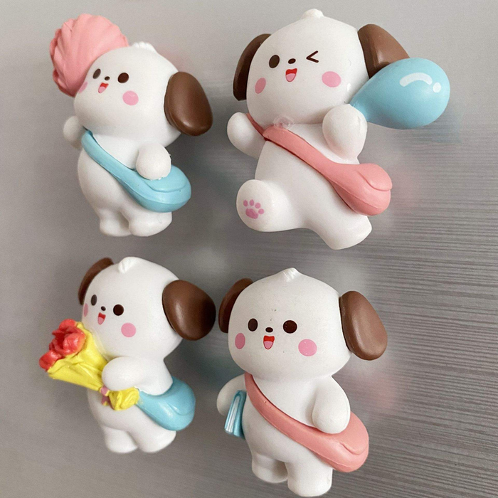 Set of four cute kawaii white and brown puppy miniature figurines with pink cheeks, carrying blue and pink sling bags, holding accessories like flowers and a balloon,