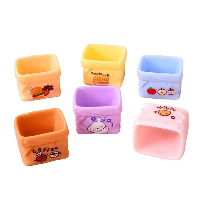 A set of 6 colorful miniature paper bag-style containers in pastel and bright shades, featuring cute cartoon prints like burgers, coffee, and fruits