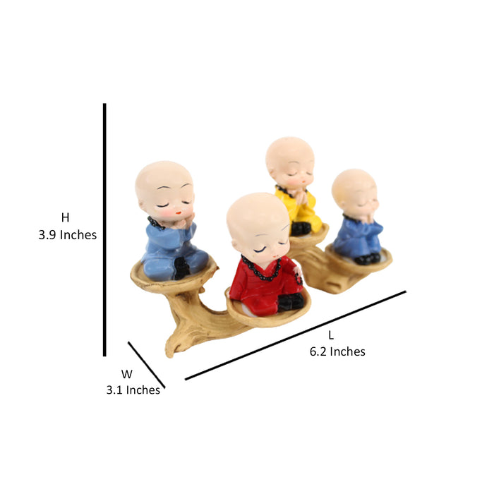 Wonderland ( Set of 4) 4 inch height Four sitting Monk on a tree bark