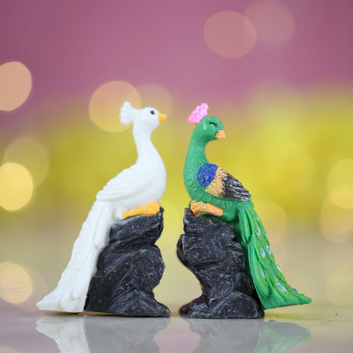 Miniature toys Set of 2 sitting on rock Peacock on Stone