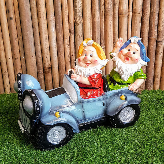 Two Gnome Sitting in Car for Garden Decoration