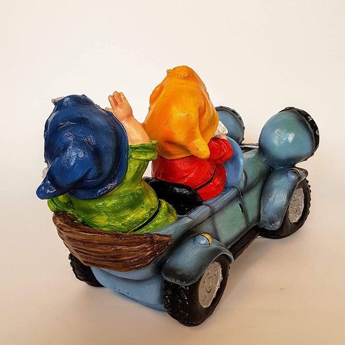Two Gnome Sitting in Car for Garden Decoration