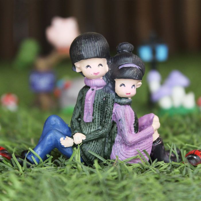 Buy Couple Sitting with back fairy garden toys for décor Online